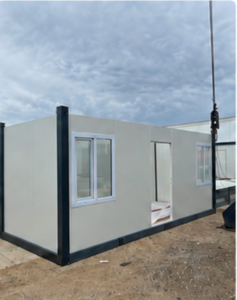 Wall panels being lifted into place on an EROUnits office